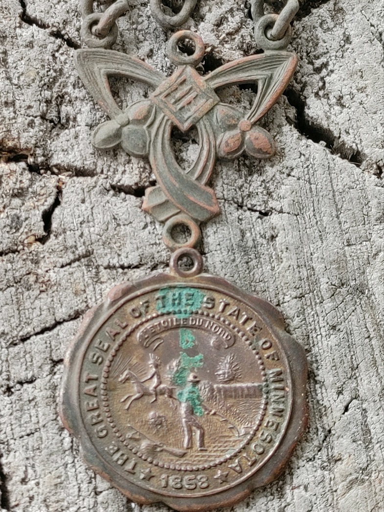 MNStateSealMedalCloseup.jpg