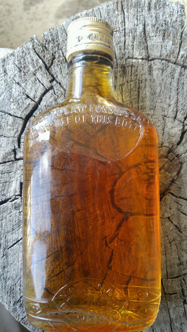 NationalDistilleryFullWhiskeyBottle.jpg